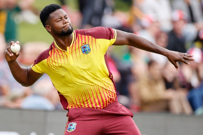 West Indies' Romario Shepherd celebrates after catching a ball dismissing South Africa's David Miller (not seen) during the first T20 international cricket match between South Africa and West Indies at SuperSport Park in Centurion on March 25, 2023.