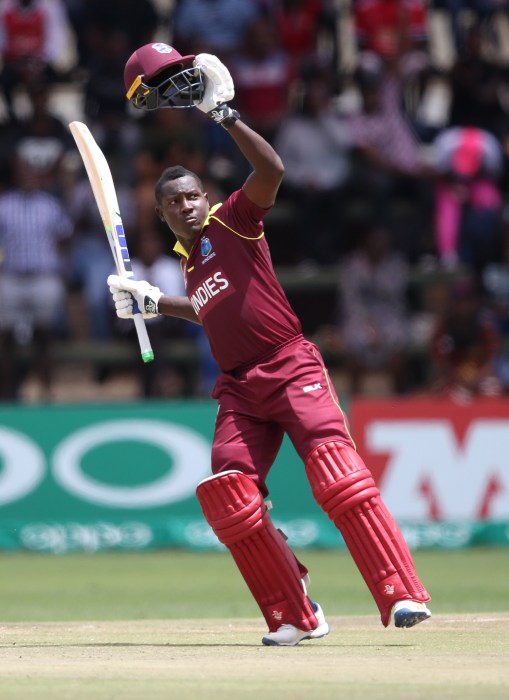 Rovman Powell of The West Indies celebrates his century during The ICC Cricket World Cup Qualifier between The West Indies and Ireland at The Harare Sports Club on March 10, 2018 in Harare, Zimbabwe.