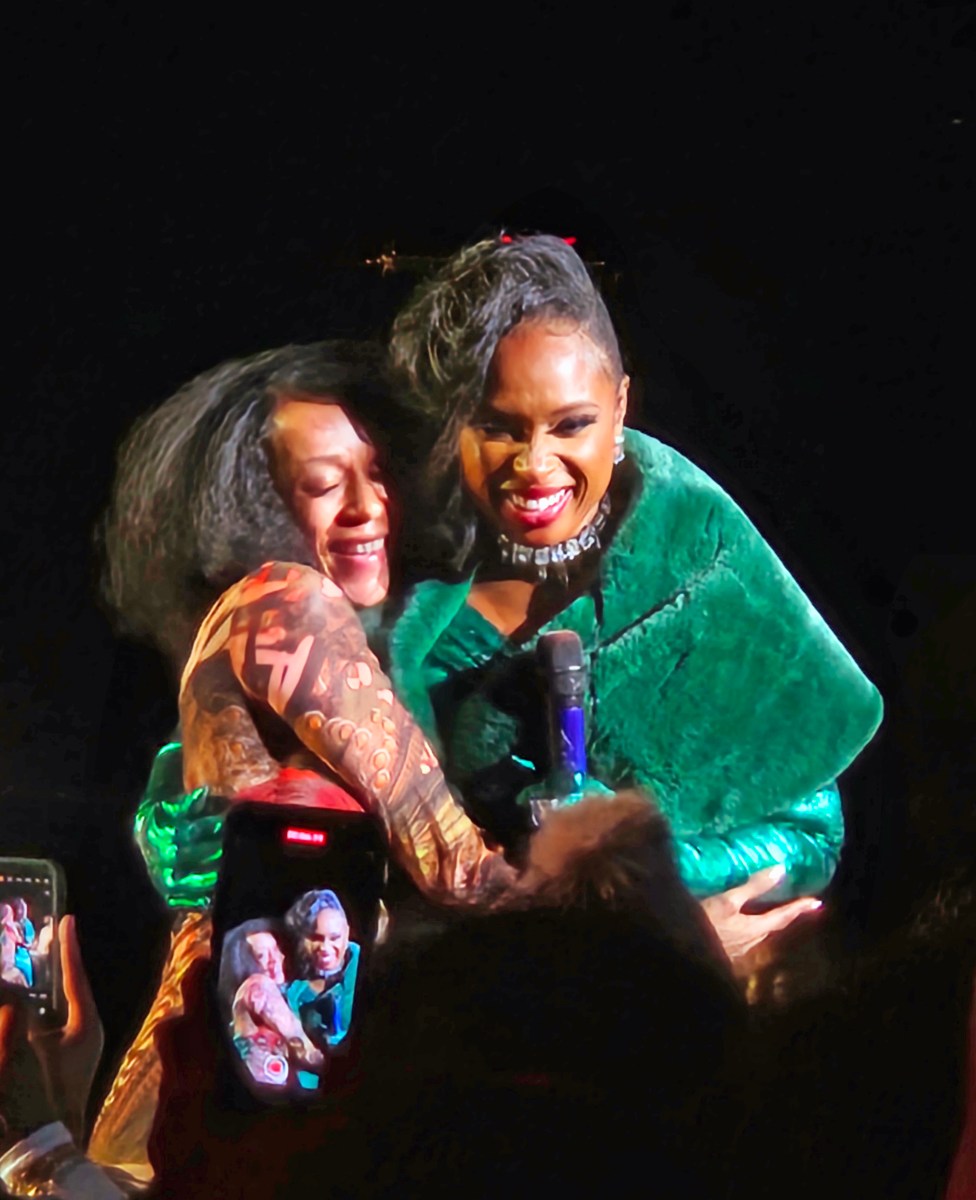 Jennifer Hudson is pictured with an excited fan after singing in the audience at her inaugural concert at Brooklyn's Kings Theatre on Flatbush to promote her very first Christmas album, “The Give of Love,” during an intimate live experience on Nov.24, 2024.