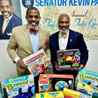 NYS Senator Kevin Parker left, with Noble James Vaugh of Medina Temple #19 during the toy distribution at his Brooklyn District 21 Office.