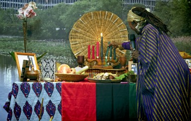 Ayo Handy Kendi kicks off the first day of Kwanzaa at the Anacostia Community Museum in Washington, DC on Dec. 26, 2023.