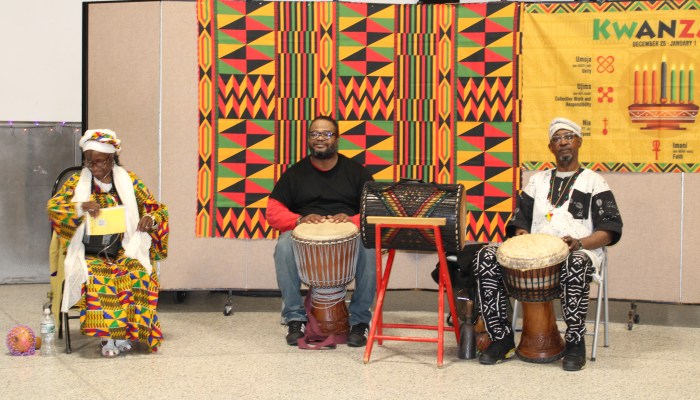 Percussionist Baba Raheem and Sister Arleen staged a riveting performance that got the audience on its feet for a night of pre-Kwanzaa celebration last Saturday evening at Carmine Carro Community Center in Marine Park, Brooklyn.