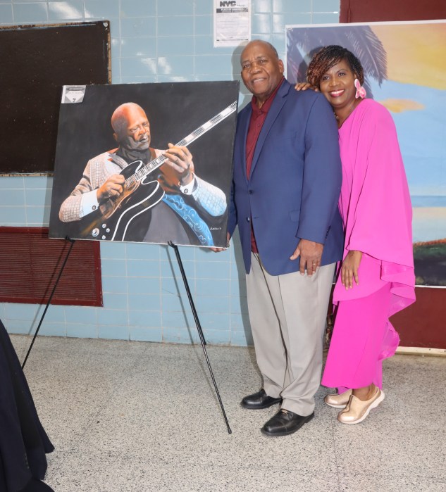 Ruel "Doc" Wallace and his "daughter" Opal Bailey with "The Guitarist.”