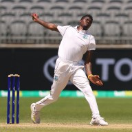 Alzarri Joseph of the West Indies bowling during day four of the First Test match between Australia and the West Indies at Optus Stadium on December 03, 2022 in Perth, Australia.