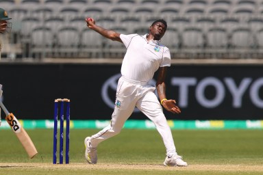 Alzarri Joseph of the West Indies bowling during day four of the First Test match between Australia and the West Indies at Optus Stadium on December 03, 2022 in Perth, Australia.