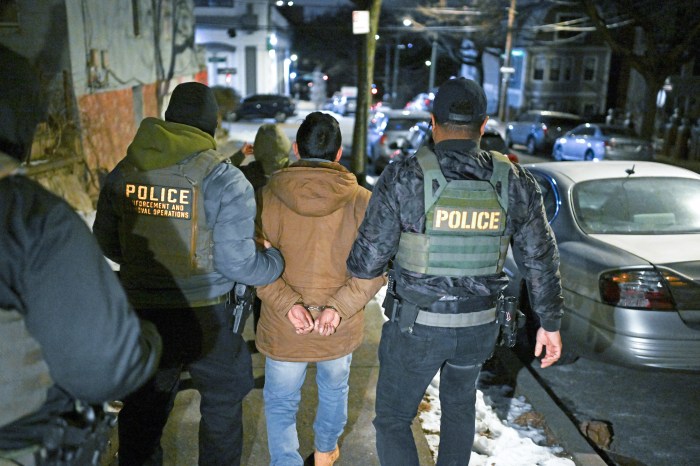 Law enforcement walk with Leonardo Fabian Cando Juntamay as he was detained in the Bronx during ICE led operations to apprehend illegal immigrants on Tuesday Jan. 28, 2025 in New York, NY.