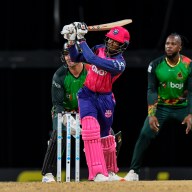 Alick Athanaze (L) of Barbados Royals hits 4 during the Men's 2024 Republic Bank Caribbean Premier League match 18 between Barbados Royals and Saint Kitts and Nevis Patriots at Kensington Oval on Sept. 17, 2024 in Bridgetown, Barbados.