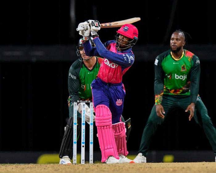 Alick Athanaze (L) of Barbados Royals hits 4 during the Men's 2024 Republic Bank Caribbean Premier League match 18 between Barbados Royals and Saint Kitts and Nevis Patriots at Kensington Oval on Sept. 17, 2024 in Bridgetown, Barbados.