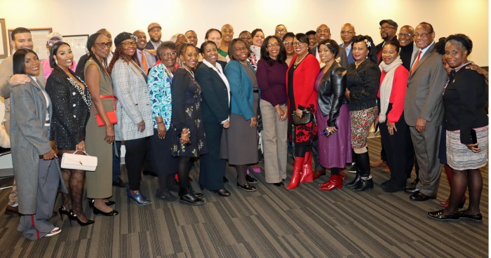 New CACCI Prez Jean Joseph, center, eighth from left, and Council Member Rita Joseph to her immediate left, with attendees at CACCI inaugural 'Meet and Greet.’