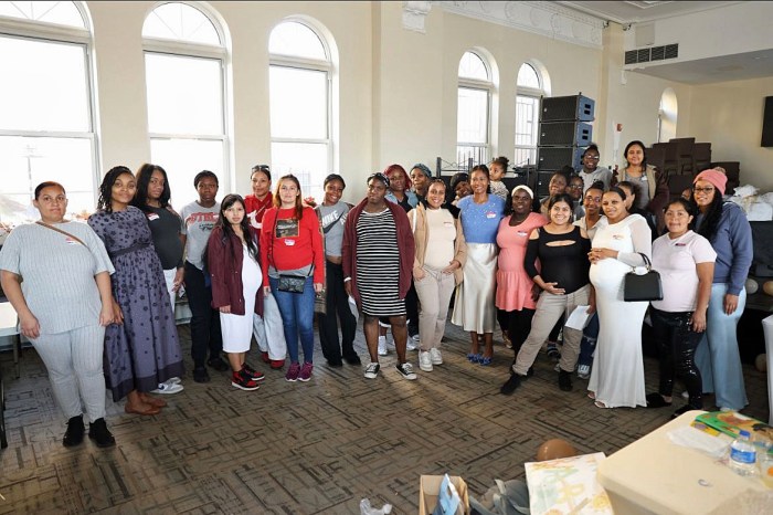 Some of the recipients and organization members of BP Anthony Reynoso's Community Shower Fund.