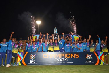 St.Lucia Kings players pose for a photo after winning the Men's 2024 Republic Bank Caribbean Premier League Final match between Saint Lucia Kings and Guyana Amazon Warriors at Providence Stadium on Oct. 06, 2024 in Georgetown, Guyana.