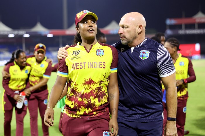 Hayley Matthews of West Indies celebrates with West Indies Head Coach Shane Deitz following the ICC Women's T20 World Cup 2024 match between Bangladesh and West Indies at Sharjah Cricket Stadium on Oct. 10, 2024 in Sharjah, United Arab Emirates.