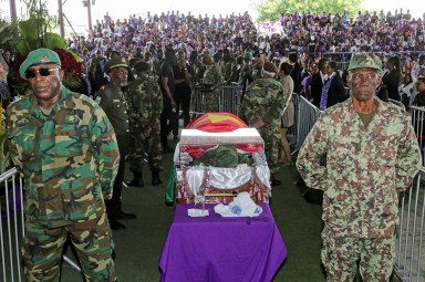 Military members stand near the body of Suriname ex-President Desi Bouterse, at his funeral in Paramaribo, Suriname, January 4, 2025.