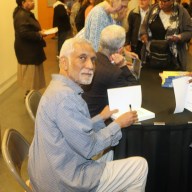 Frankie McIntosh signed a copy of his book at the launching ceremony at Brooklyn College in November 2024.