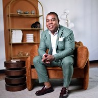 Executive Chef Wesly Jean Simon, owner of Djon Djon Restaurant, poses in the restaurant’s kitchen.