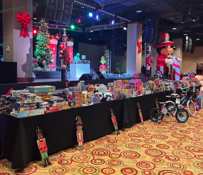 More than 100 toys were displayed and distributed to children during the festive event.