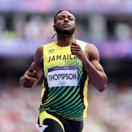 Kishane Thompson of Team Jamaica competes during the Men's 100m Round 1 on day eight of the Olympic Games Paris 2024 at Stade de France on Aug. 03, 2024 in Paris, France.