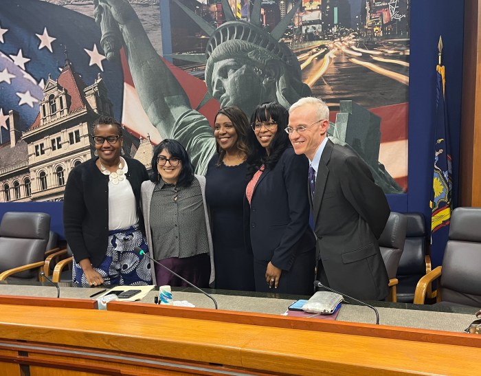 Attorney General Letitia James (center) with other members of her panel.