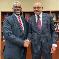 Dr. Anthony E. Munroe, left, with Dr. David A Thomas.