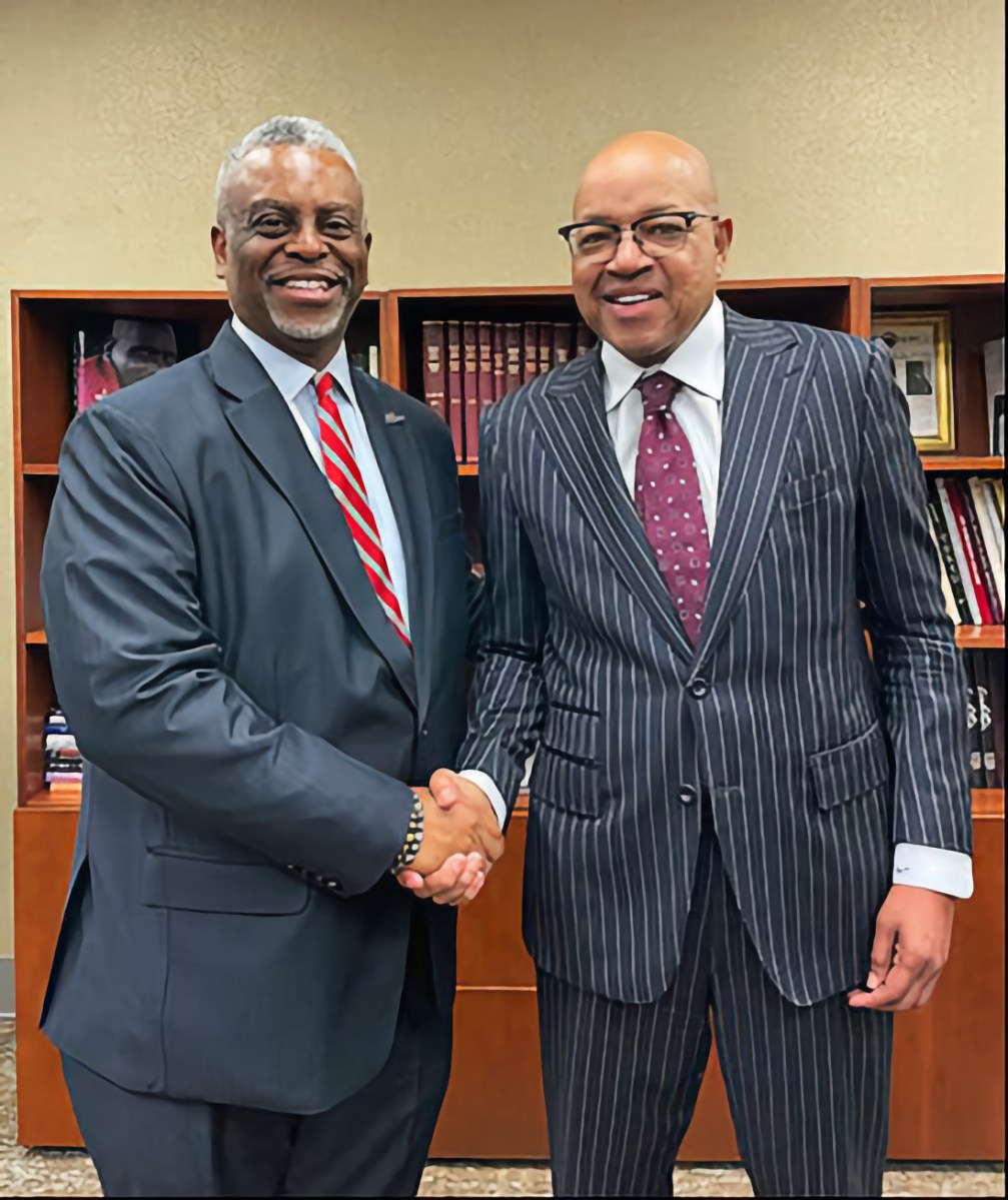 Dr. Anthony E. Munroe, left, with Dr. David A Thomas.