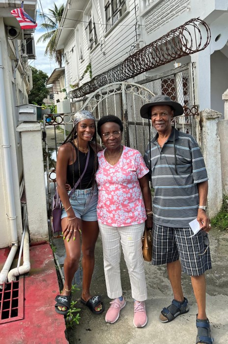 Ashley Capri with her grandparents in Guyana. She credits her grandmother for inspiring her passion for design.