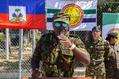 Jack O. Ombaka spokesman for the Multinational Security Mission in Haiti (MMS) addresses the press as second contingent of 70 Salvadoran soldiers arrive in Haiti to join UN-backed multinational force aimed at combating armed criminal gangs in Port-Au-Prince, Haiti on February 04, 2025. Despite the presence of the multinational force, gangs continue to wreak havoc in metropolitan areas of Port-au-Prince.