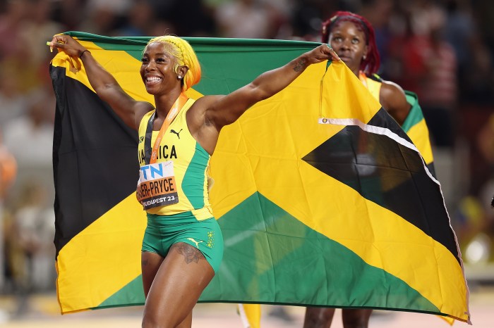 Bronze medalist Shelly-Ann Fraser-Pryce of Team Jamaica and silver medalist Shericka Jackson of Team Jamaica celebrate after the Women's 100m Final during day three of the World Athletics Championships Budapest 2023 at National Athletics Centre on Aug. 21, 2023 in Budapest, Hungary.