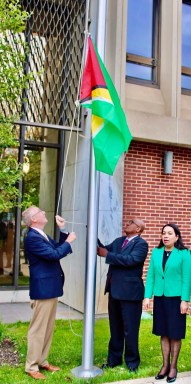 Supervisor Don Clavin, Hempstead Town Board, left, Consul General of Guyana to New York, Michael E. Brotherson, Permanent Representative to the UN, Carolyn Rodrigues Birkett, during an Independence flag raising ceremony last year.