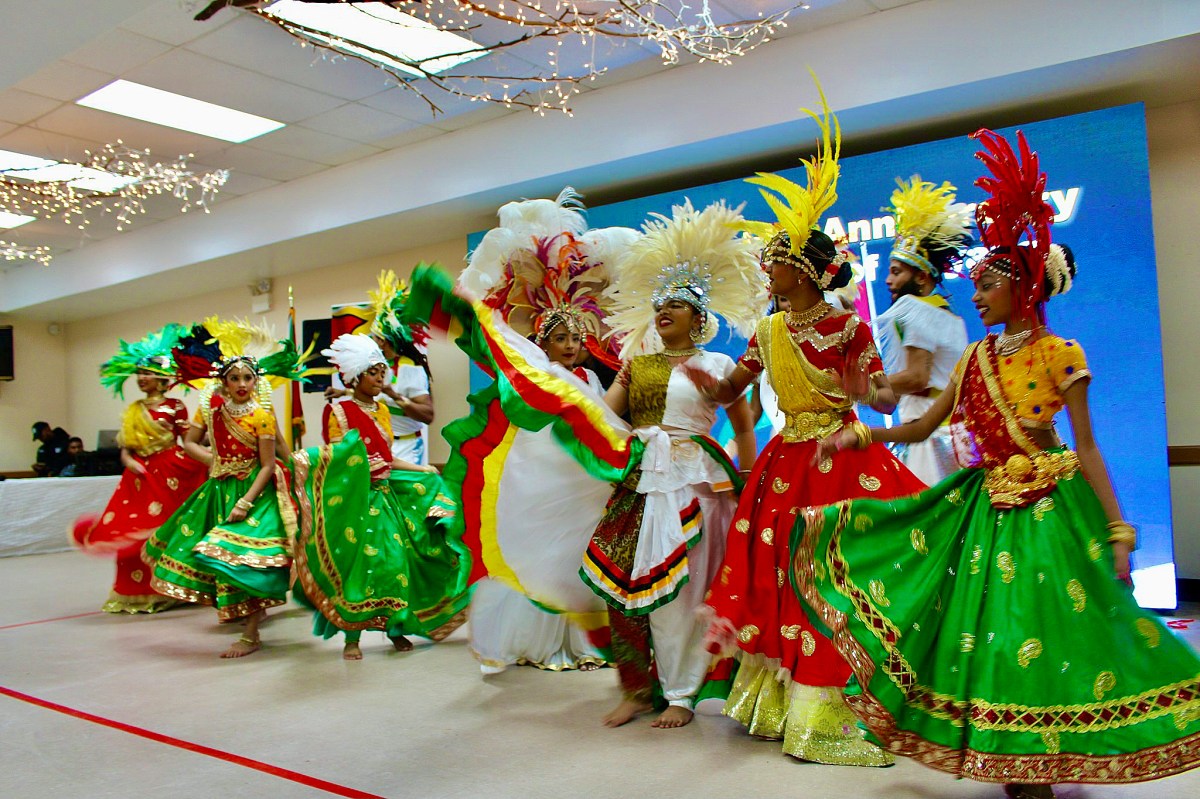 The colorfully dressed students of the Saraswatie Dance Academy, Queens, put on a stirring chutney, Soca, and Calypso presentation to wow the audience at the Guyana 55th Republic Anniversary Interfaith Church Service and Mashramani collage at St. Gabriel Episcopal Church, Hawthorne Street, Brooklyn, on Feb. 23.