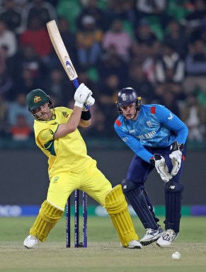 Josh Inglis of Australia plays a shot as Jamie Smith of England keeps during the ICC Champions Trophy 2025 match between Australia and England at Gaddafi Stadium on February 22, 2025 in Lahore, Pakistan.