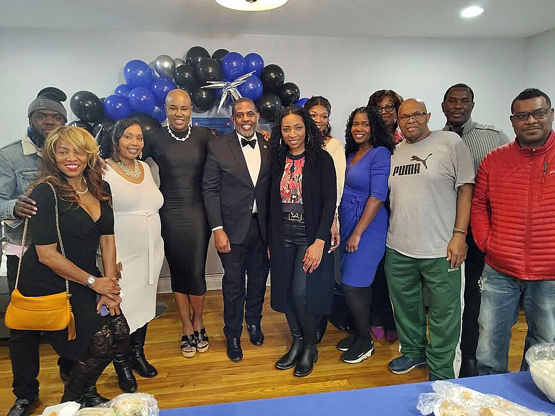 Sen. Kevin Parker, center, with attendees at the Fireside Forum East at 84th St. in Canarsie, Brooklyn.