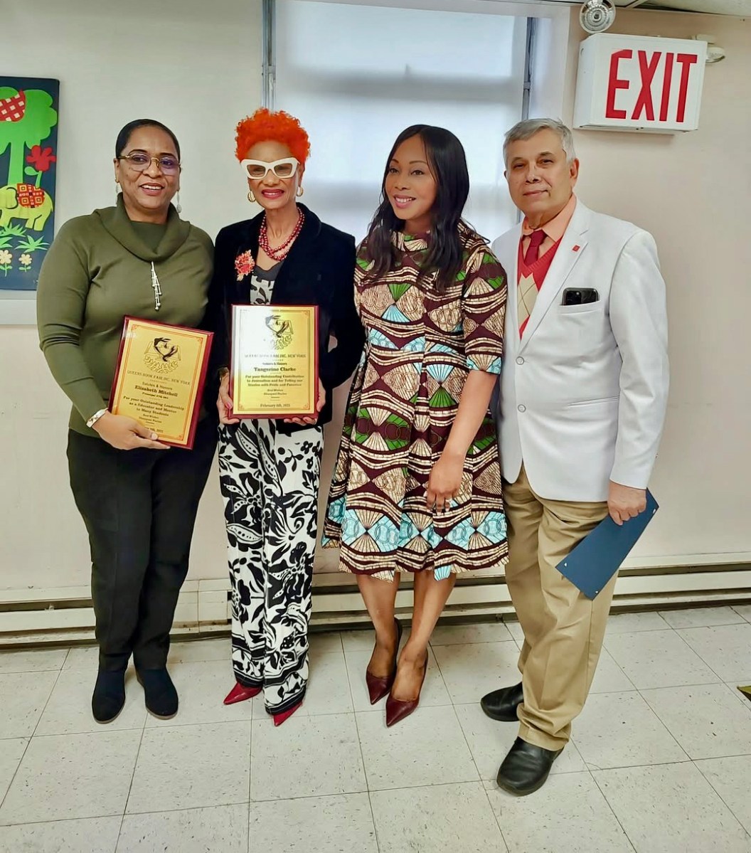 Honorees Elizabeth Mitchell, principal 27Q064 Queens; Tangerine Clarke, Caribbean Life contributor; Dr. Veronica Wiltshire, moderator; and Dr. Dhanpaul Narine, founder of the Queens Book Fair & Literary Festival, Inc., after plaques were presented on behalf of the organization., during a Black History presentation, at the Queens Library Richmond Hill Branch, on Feb. 8.