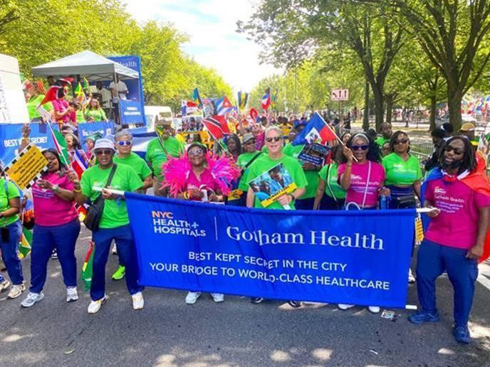 Gotham Health staff proudly participating in New York City’s 2024 West Indian Day parade, promoting healthcare awareness and celebrating diversity.