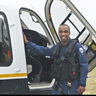 Detective Royston Charles, who migrated to the U.S. at 13, followed in his father’s footsteps to join law enforcement. Now, he serves in the NYPD’s aviation unit, assisting ground officers from above.