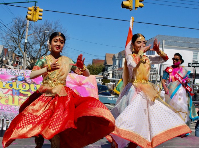 Two pretty young dancers go through their paces on stage during a cultural presentation at the intersection at 133 St, and Liberty Avenue, before the kickoff of the 37th Phagwah Parade on Sunday, March 23, 2025 in Richmond Hill,