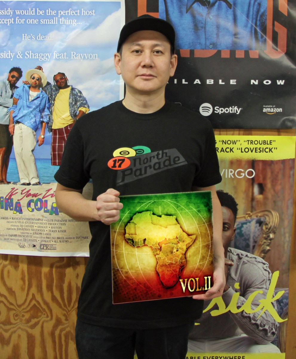 Eisaku "Selector A" Yamaguchi with his latest album “Reggae Loves Africa Vol. 2.”