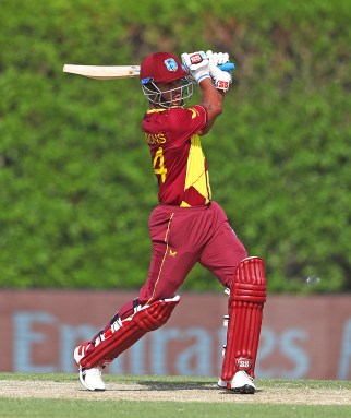 Lendl Simmons of the West Indies hits the ball towards the boundary during the Pakistan and West Indies warm Up Match prior to the ICC Men's T20 World Cup at on Oct. 18, 2021 in Dubai, United Arab Emirates.