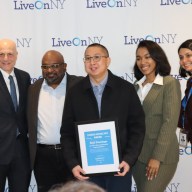 Emil Domingo (center), RN, at St. John’s Episcopal Hospital was honored by LiveOnNY. He is pictured with LiveOnNY team members (from left): Leonard Achan, president and chief executive officer; Abraham Warshaw, MD, senior vice president and chief medical officer; Natasha Thomas, hospital services specialist; and Raida Hossain, community & government affairs liaison.