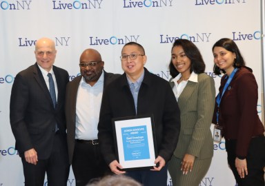 Emil Domingo (center), RN, at St. John’s Episcopal Hospital was honored by LiveOnNY. He is pictured with LiveOnNY team members (from left): Leonard Achan, president and chief executive officer; Abraham Warshaw, MD, senior vice president and chief medical officer; Natasha Thomas, hospital services specialist; and Raida Hossain, community & government affairs liaison.