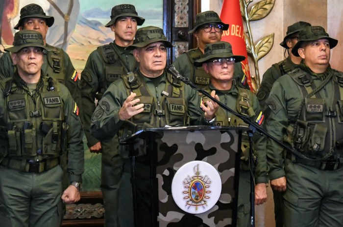 Venezuela's Defence minister Vladimir Padrino Lopez (2nd L) speaks during a press conference in Caracas on July 30, 2024.